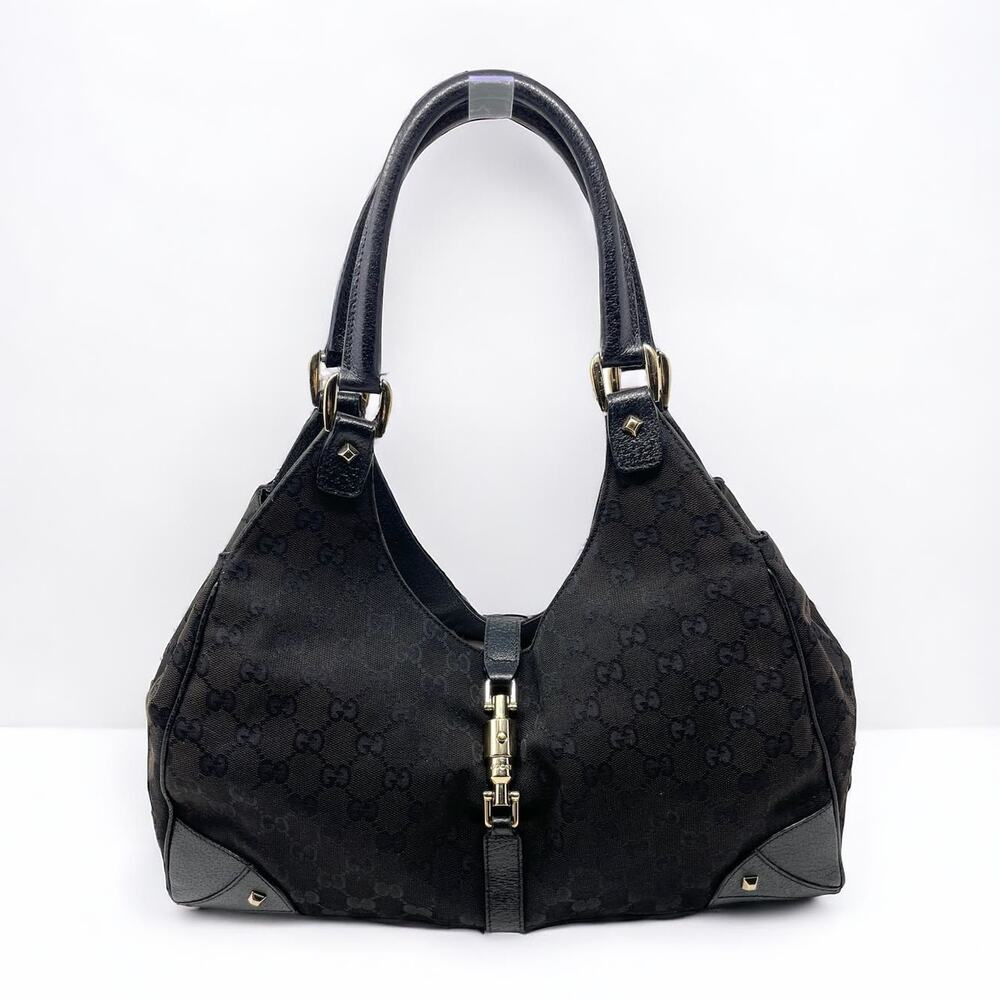 SOLDGucci Monogram GG Jackie Piston Nailhead Vintage Shoulder Bag Canvas Leather